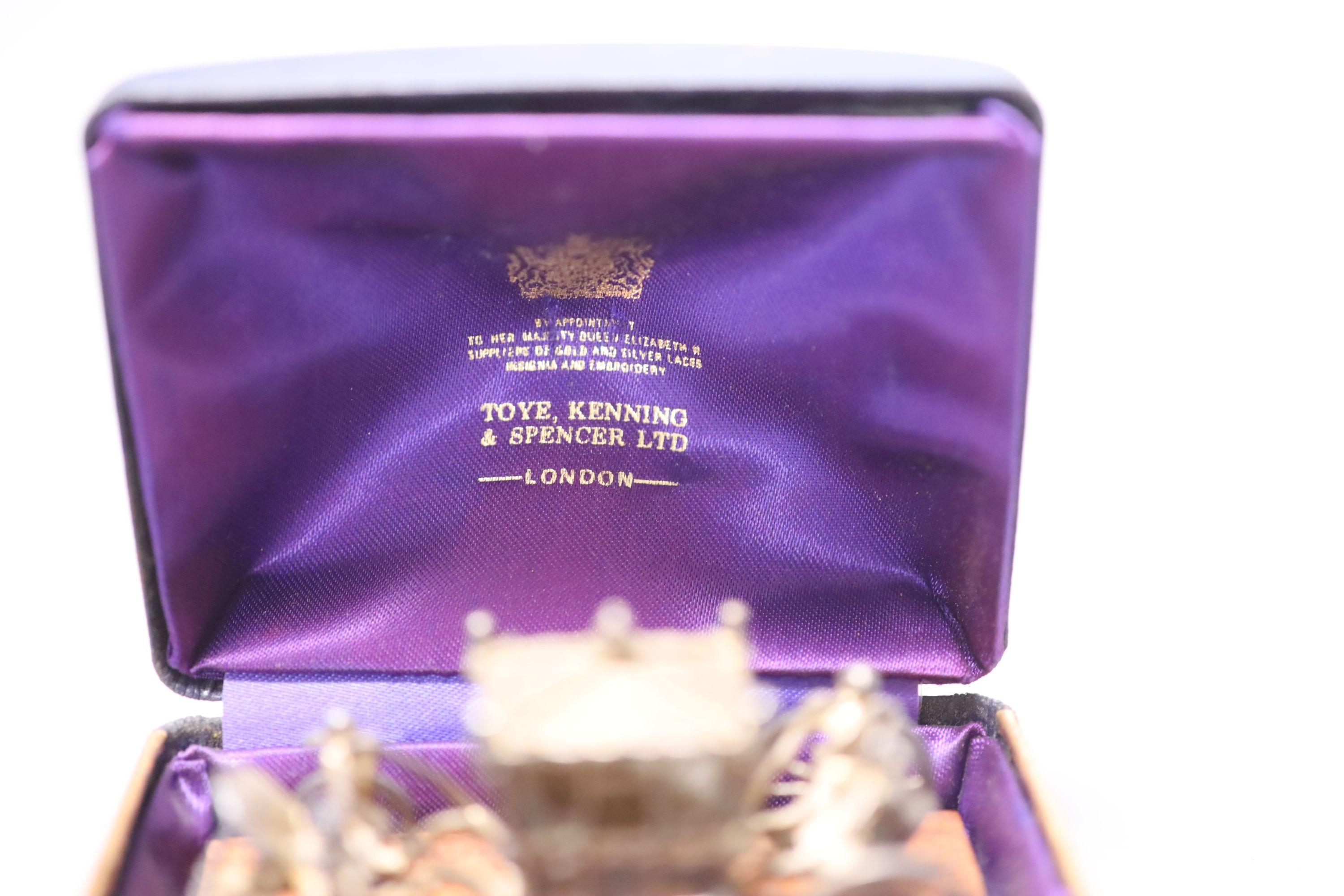 A 1970s miniature silver model of the Coronation coach, London, 1977, 75mm, fixed on a wooden base, in box.